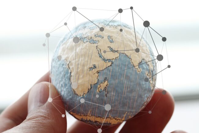 icon on wooden ball of website and internet contact us page conc